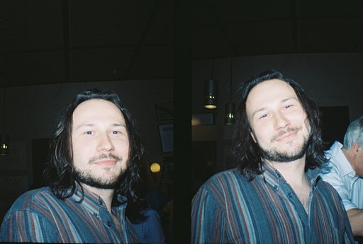 What is a half-frame film camera?