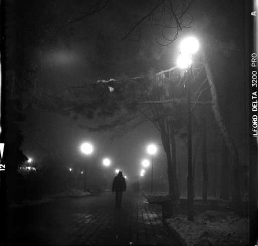 What are the difficulties of shooting film in low light?