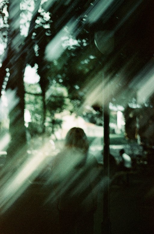 Why do photographers use lens filters?